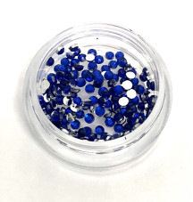 Cristal de unghii într-un recipient (albastru)