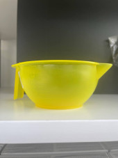 Hair coloring bowl with cloves, transparent yellow